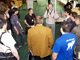 Monty (the main engineer and co-founder of MySQL, one of the most famous personality of the conference) talking with the students outside, in the conference hall.